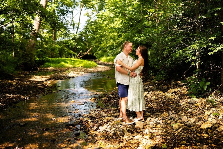 Groom to be proposing during surprise wedding proposal at family home | Emotional reaction during surprise wedding proposal at family home in Missouri | Couple celebrating after surprise wedding proposal at family home | Portraits of newly engaged couple after surprise wedding proposal