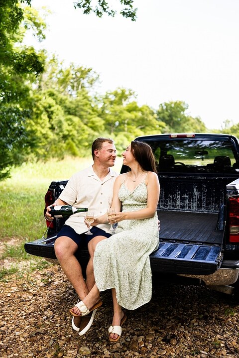 Groom to be proposing during surprise wedding proposal at family home | Emotional reaction during surprise wedding proposal at family home in Missouri | Couple celebrating after surprise wedding proposal at family home | Portraits of newly engaged couple after surprise wedding proposal