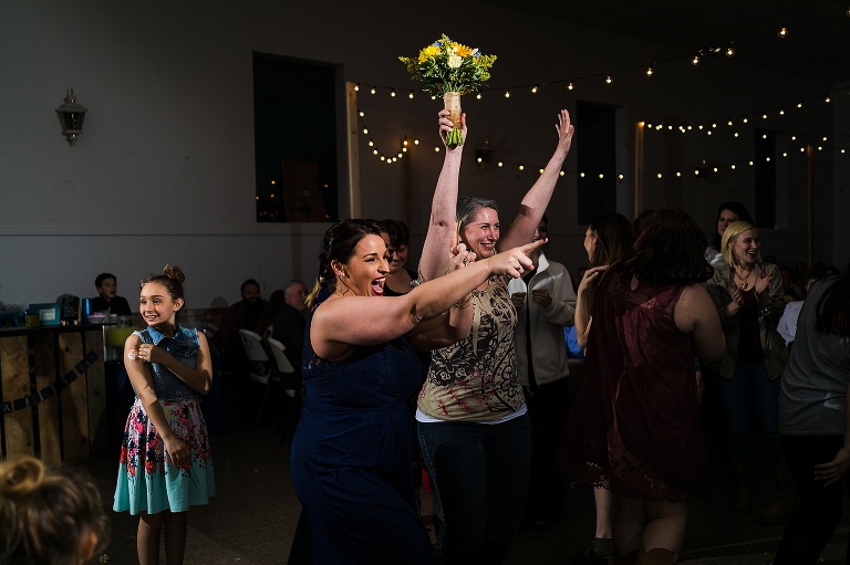 Pea Ridge Farms | St Charles Wedding Photographer | Warrenton Wedding Photographer | Spring Wedding | Herman Missouri | Warrenton MO | Blues Fans | Country wedding | Rustic | Boots and Lace | St Louis Blues | Hockey Fans | NHL | Hockey Sticks | Lets go Blues | Jonesburg Community Center | Jonesburg Community Hall | Jonesburg Missouri | Bouquet Toss
