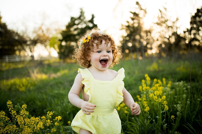 St Charles Family Photographer | St Charles Photographer | Warrenton Mo Family Photographer | Warrenton Mo Photographer | Wright City Mo Family Photographer | Wright City Mo Photographer | St louis Family Photographer | St Louis Photographer | Missouri Family Photographer | Missouri Photographer | Red Head | Red Curly Hair | Yellow Romper | Spring Flowers | Wildflowers | Missouri Wildflowers | Wild Child | Flower Child | Outdoor Photographer | What to wear Spring Session | Flower Crown | Yellow Flowers | Rag weed | 