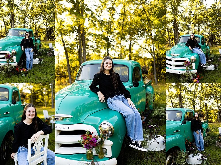  Senior girl smiles beside vintage teal truck and wildflowers in High Hill Missouri