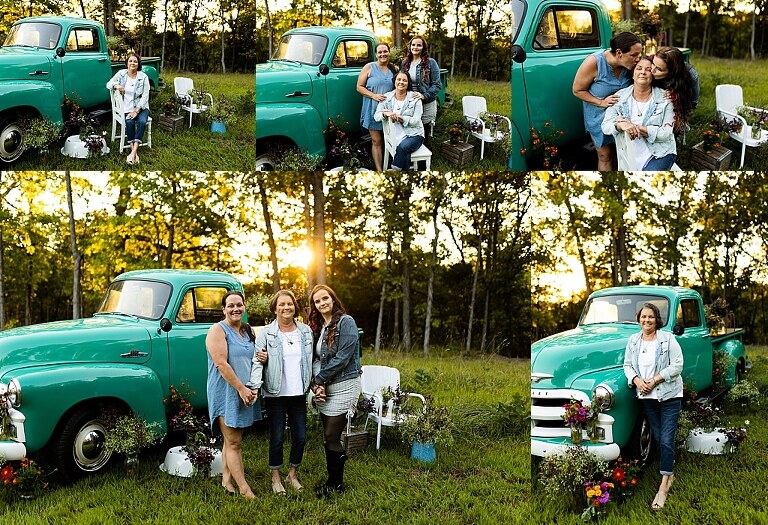 Family smiling together by a teal vintage truck and wildflowers in High Hill Missouri