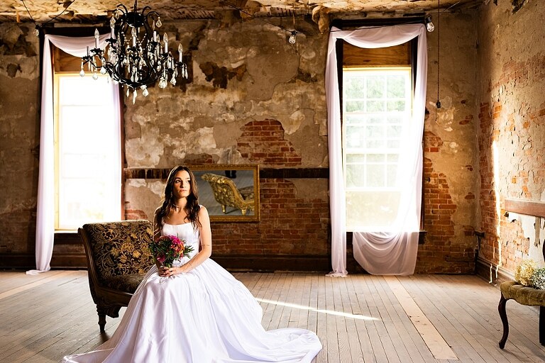 Bride and groom portraits at Heritage on Broadway Wedding Venue in Elsberry MO, historic wedding setup, vintage decor, Missouri wedding photographer