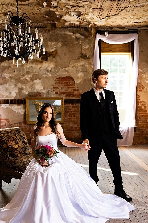 Bride and groom portraits at Heritage on Broadway Wedding Venue in Elsberry MO, historic wedding setup, vintage decor, Missouri wedding photographer