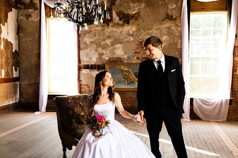 Bride and groom portraits at Heritage on Broadway Wedding Venue in Elsberry MO, historic wedding setup, vintage decor, Missouri wedding photographer