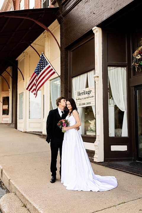 Bride and groom portraits at Heritage on Broadway Wedding Venue in Elsberry MO, historic wedding setup, vintage decor, Missouri wedding photographer