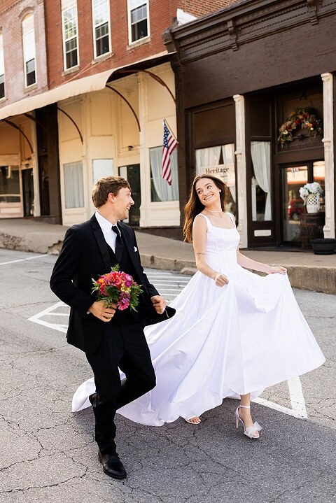 Bride and groom portraits at Heritage on Broadway Wedding Venue in Elsberry MO, historic wedding setup, vintage decor, Missouri wedding photographer