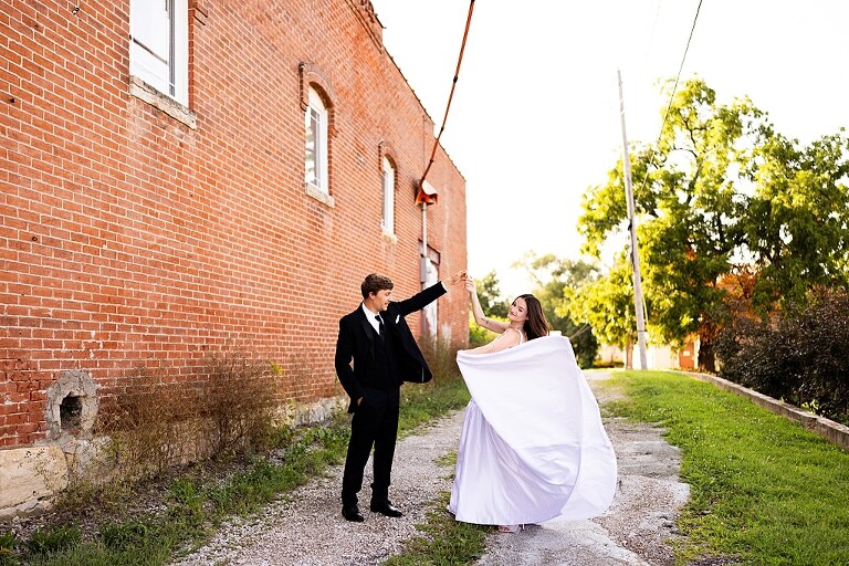 Bride and groom portraits at Heritage on Broadway Wedding Venue in Elsberry MO, historic wedding setup, vintage decor, Missouri wedding photographer