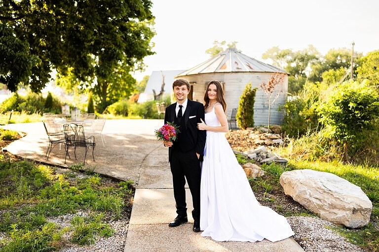 Bride and groom portraits at Heritage on Broadway Wedding Venue in Elsberry MO, historic wedding setup, vintage decor, Missouri wedding photographer