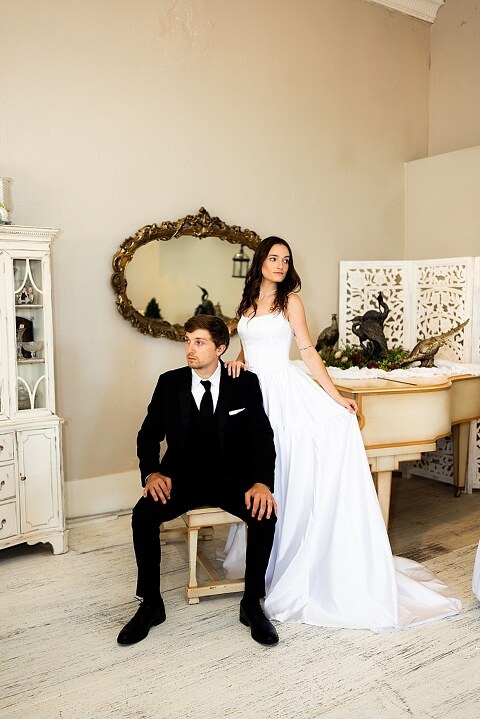 Bride and groom portraits at Heritage on Broadway Wedding Venue in Elsberry MO, historic wedding setup, vintage decor, Missouri wedding photographer