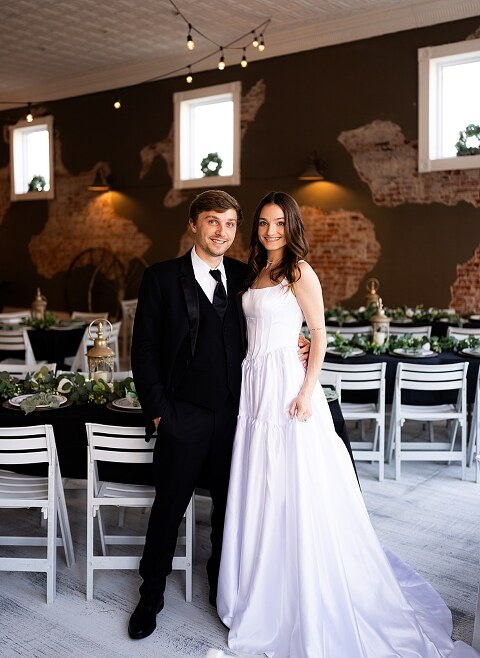 Bride and groom portraits at Heritage on Broadway Wedding Venue in Elsberry MO, historic wedding setup, vintage decor, Missouri wedding photographer