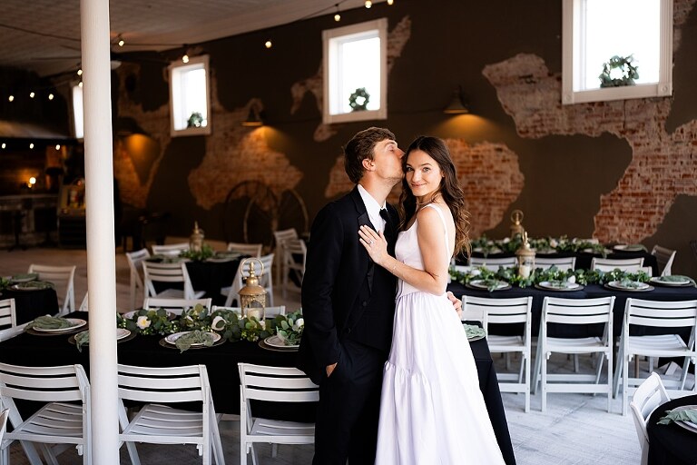 Bride and groom portraits at Heritage on Broadway Wedding Venue in Elsberry MO, historic wedding setup, vintage decor, Missouri wedding photographer