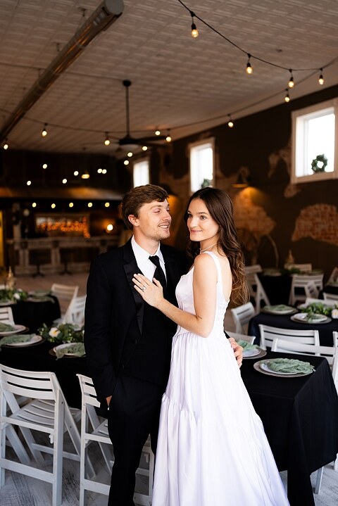 Bride and groom portraits at Heritage on Broadway Wedding Venue in Elsberry MO, historic wedding setup, vintage decor, Missouri wedding photographer
