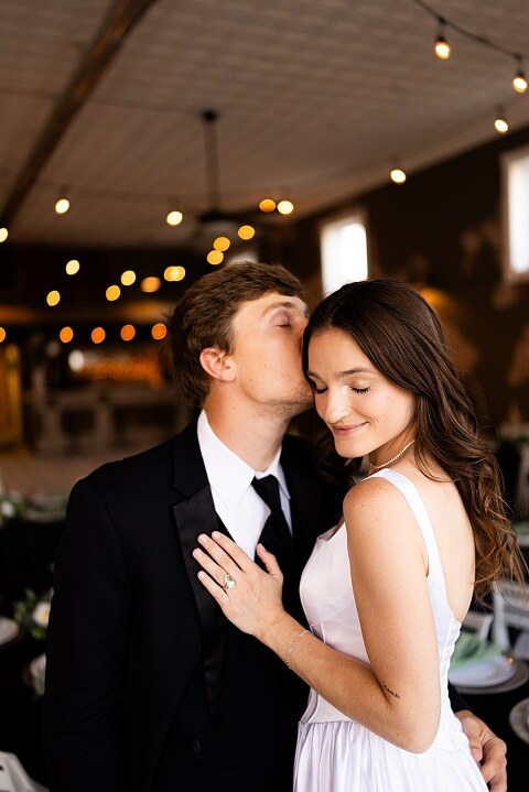 Bride and groom portraits at Heritage on Broadway Wedding Venue in Elsberry MO, historic wedding setup, vintage decor, Missouri wedding photographer