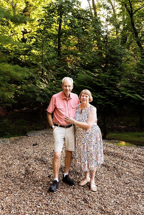 Extended family photos at Innsbrook Missouri with kids, grandparents, and parents celebrating an anniversary in summer heat.
