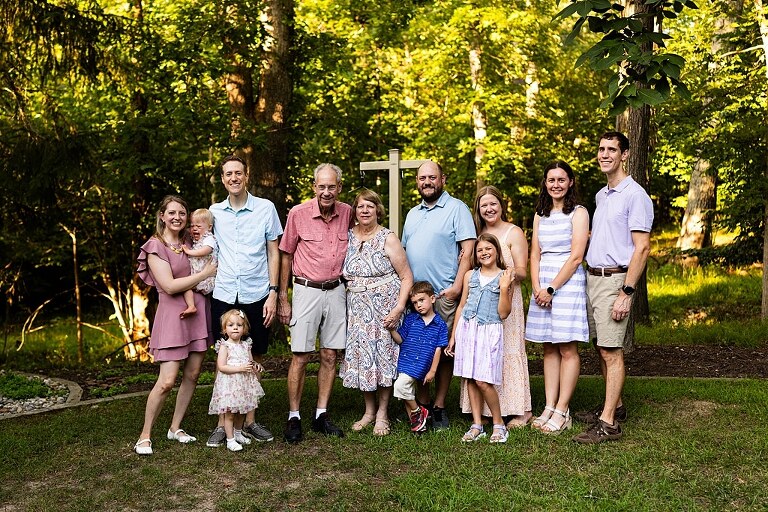 Extended family photos at Innsbrook Missouri with kids, grandparents, and parents celebrating an anniversary in summer heat.