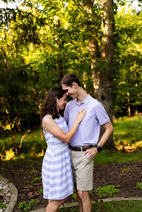 Extended family photos at Innsbrook Missouri with kids, grandparents, and parents celebrating an anniversary in summer heat.