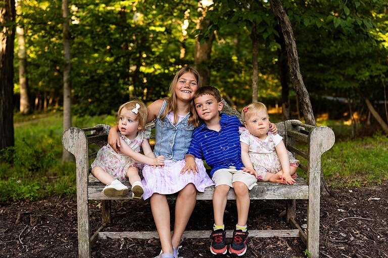 Extended family photos at Innsbrook Missouri with kids, grandparents, and parents celebrating an anniversary in summer heat.