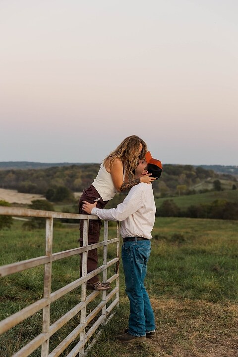 Family standing together in a warm country field during their 90’s style session.
Parents holding their kids with soft golden light behind them.
Family walking through a field during a country-inspired photo shoot.
Close-up of parents smiling during their session with Taylor Ligon Photography.
Kids laughing while standing between their parents in a sunny field.