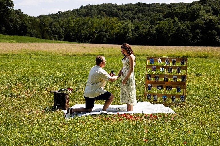 Groom to be proposing during surprise wedding proposal at family home | Emotional reaction during surprise wedding proposal at family home in Missouri | Couple celebrating after surprise wedding proposal at family home | Portraits of newly engaged couple after surprise wedding proposal