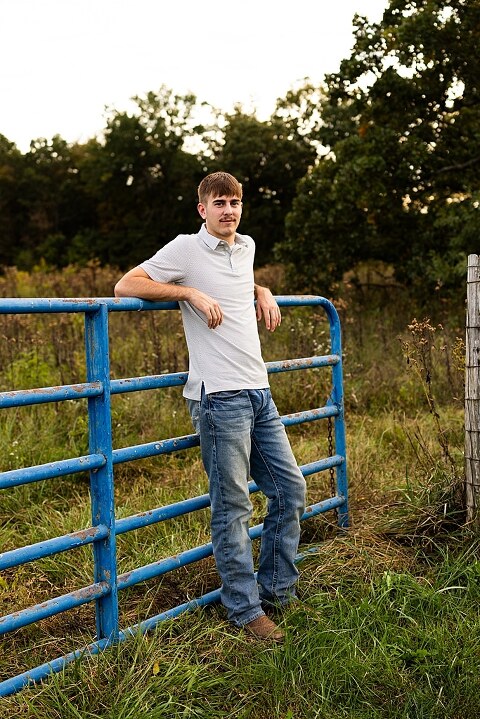 Twin senior boys from Warrenton High School standing on a gravel road in High Hill Missouri.
Brothers laughing together during their senior session in a country field.
Twin seniors leaning against a fence with warm evening light behind them.
Warrenton High School seniors walking side by side down a gravel path.
Close–up of the twins smiling during their High Hill Missouri session.