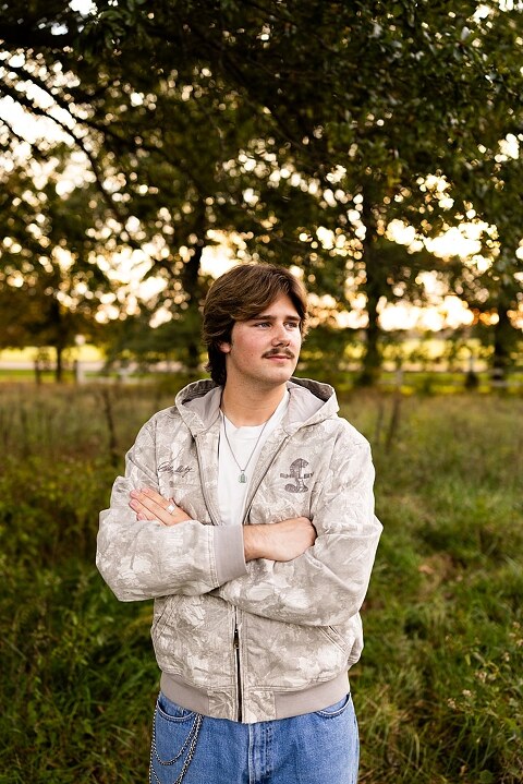 Twin senior boys from Warrenton High School standing on a gravel road in High Hill Missouri.
Brothers laughing together during their senior session in a country field.
Twin seniors leaning against a fence with warm evening light behind them.
Warrenton High School seniors walking side by side down a gravel path.
Close–up of the twins smiling during their High Hill Missouri session.