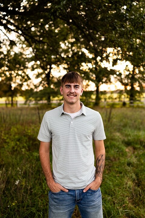 Twin senior boys from Warrenton High School standing on a gravel road in High Hill Missouri.
Brothers laughing together during their senior session in a country field.
Twin seniors leaning against a fence with warm evening light behind them.
Warrenton High School seniors walking side by side down a gravel path.
Close–up of the twins smiling during their High Hill Missouri session.