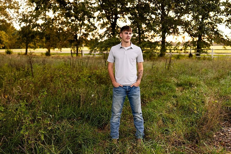 Twin senior boys from Warrenton High School standing on a gravel road in High Hill Missouri.
Brothers laughing together during their senior session in a country field.
Twin seniors leaning against a fence with warm evening light behind them.
Warrenton High School seniors walking side by side down a gravel path.
Close–up of the twins smiling during their High Hill Missouri session.