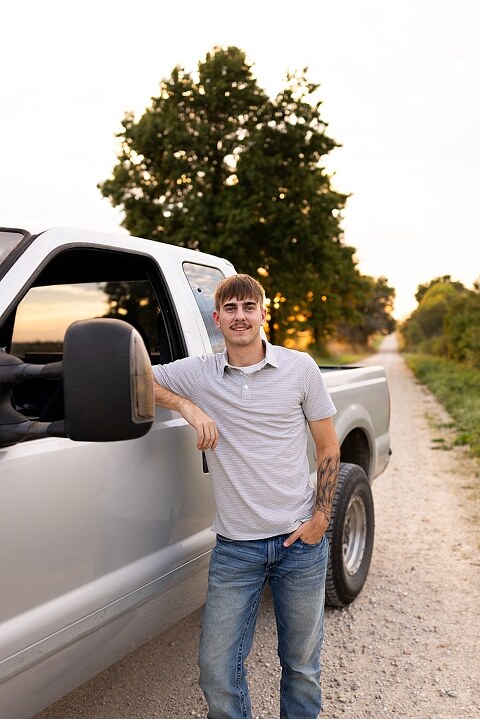 Twin senior boys from Warrenton High School standing on a gravel road in High Hill Missouri.
Brothers laughing together during their senior session in a country field.
Twin seniors leaning against a fence with warm evening light behind them.
Warrenton High School seniors walking side by side down a gravel path.
Close–up of the twins smiling during their High Hill Missouri session.