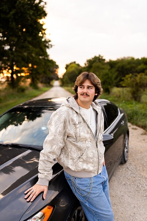 Twin senior boys from Warrenton High School standing on a gravel road in High Hill Missouri.
Brothers laughing together during their senior session in a country field.
Twin seniors leaning against a fence with warm evening light behind them.
Warrenton High School seniors walking side by side down a gravel path.
Close–up of the twins smiling during their High Hill Missouri session.