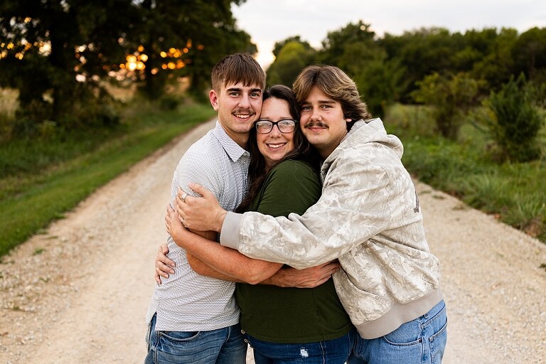 Twin senior boys from Warrenton High School standing on a gravel road in High Hill Missouri.
Brothers laughing together during their senior session in a country field.
Twin seniors leaning against a fence with warm evening light behind them.
Warrenton High School seniors walking side by side down a gravel path.
Close–up of the twins smiling during their High Hill Missouri session.