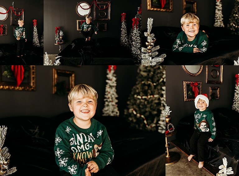 Moody Christmas mini session setup with a black bed and snow-dusted trees.
Five-year-old boy smiling on the Christmas mini session bed.
Close-up of cranberry and popcorn garland on the studio set.
Child surrounded by gold and red Christmas accents in the studio.
Full view of the 2025 Christmas Minis setup in Lake St. Louis Missouri.
