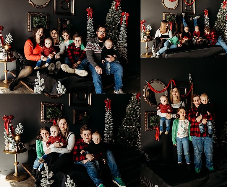 Family sitting on black bed during Christmas Mini Session with trees and garland
Parents holding newborn twins in studio with red and gold holiday details
Children sitting together on bed with Christmas trees behind them
Close up of popcorn and cranberry garland in Christmas Mini setup